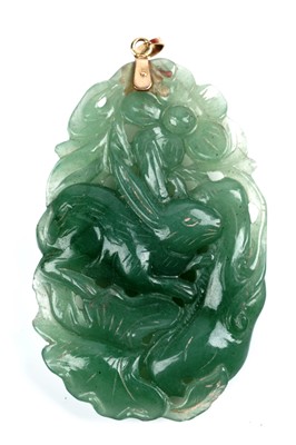 Lot 575 - A Chinese carved jade pendant