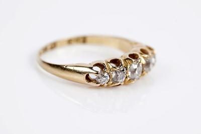 Lot 663 - An Edwardian diamond five stone dress ring