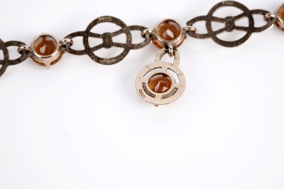 Lot 679 - A citrine pendant necklet