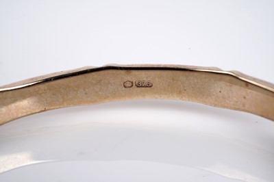 Lot 682 - A 9ct gold bamboo pattern bangle