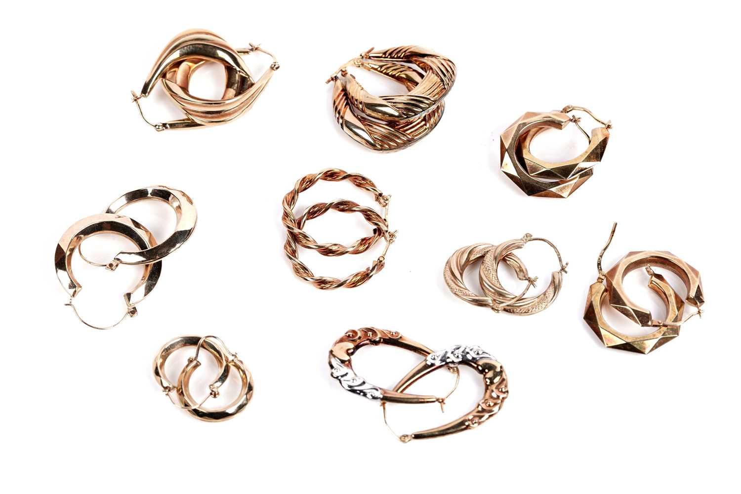 Lot 644 - A selection of nine pairs of 9ct gold hoop earrings