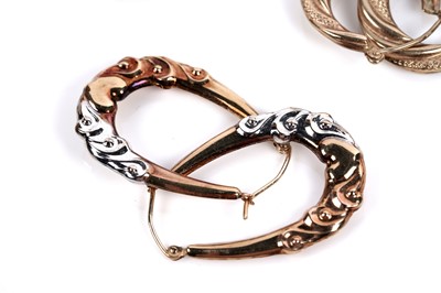 Lot 644 - A selection of nine pairs of 9ct gold hoop earrings