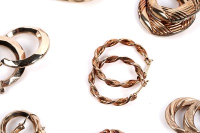 Lot 644 - A selection of nine pairs of 9ct gold hoop earrings
