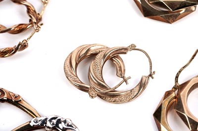 Lot 644 - A selection of nine pairs of 9ct gold hoop earrings