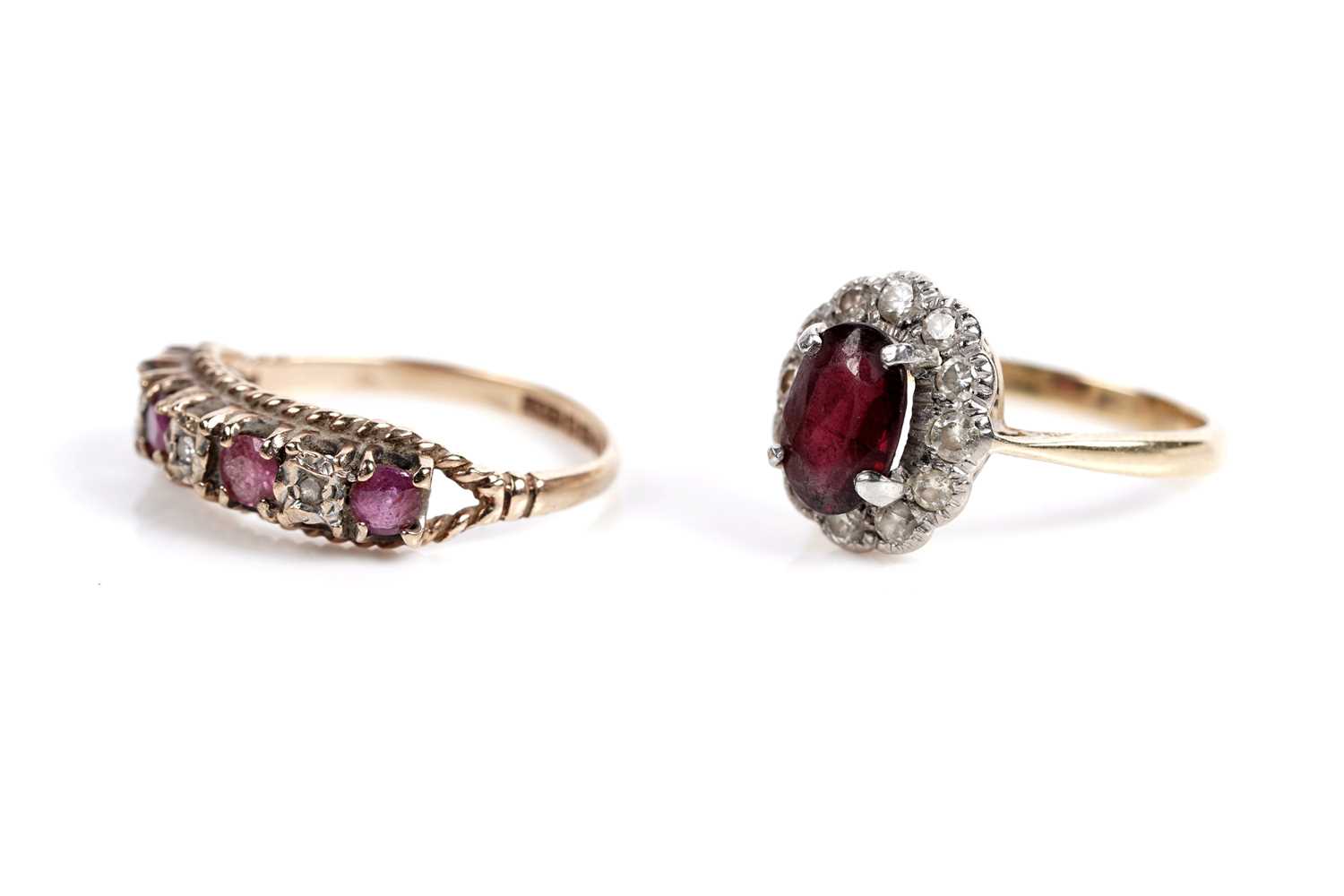 Lot 623 - A garnet and diamond cluster ring; and a ruby and diamond ring