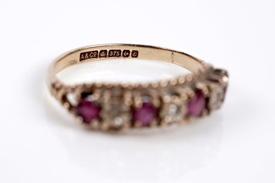 Lot 623 - A garnet and diamond cluster ring; and a ruby and diamond ring