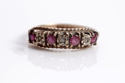 Lot 623 - A garnet and diamond cluster ring; and a ruby and diamond ring