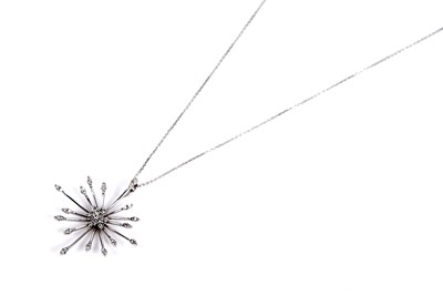 Lot 684 - A diamond cluster sunburst pendant necklace