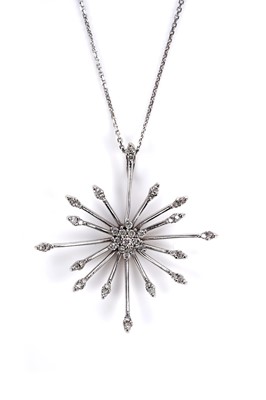 Lot 684 - A diamond cluster sunburst pendant necklace