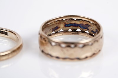Lot 634 - Two gold wedding bands; and a wishbone band