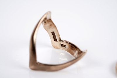 Lot 634 - Two gold wedding bands; and a wishbone band