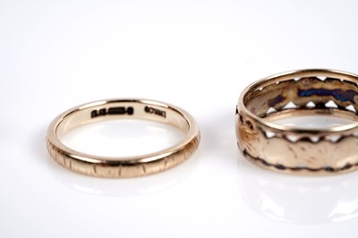 Lot 634 - Two gold wedding bands; and a wishbone band