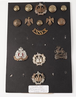Lot 89 - Three displays of cap badges, collar badges, buttons and titles