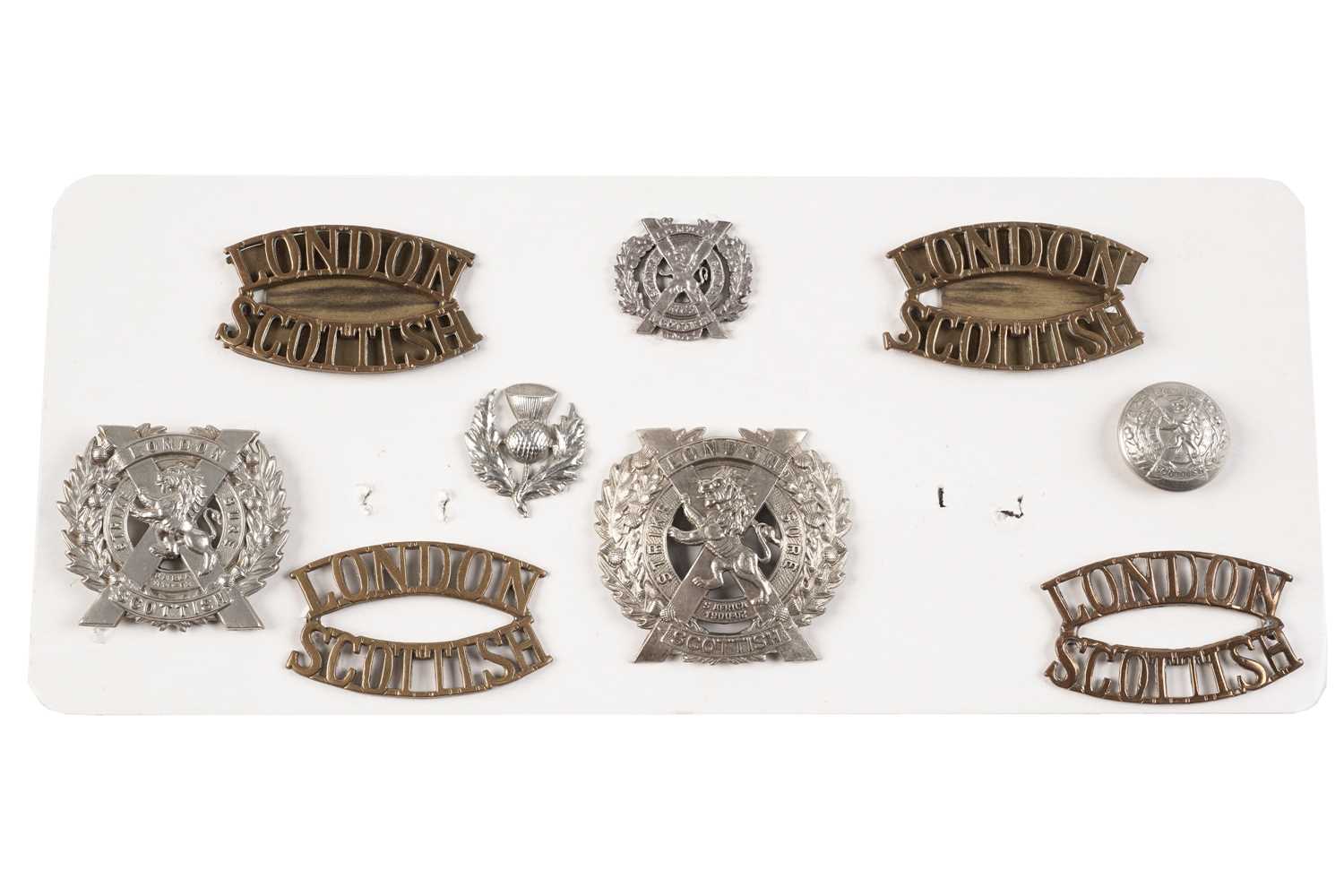 Lot 98 - London Scottish Regiment cap badges, titles, collars and button