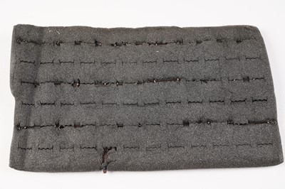 Lot 111 - A display of late pattern British regimental cap badges