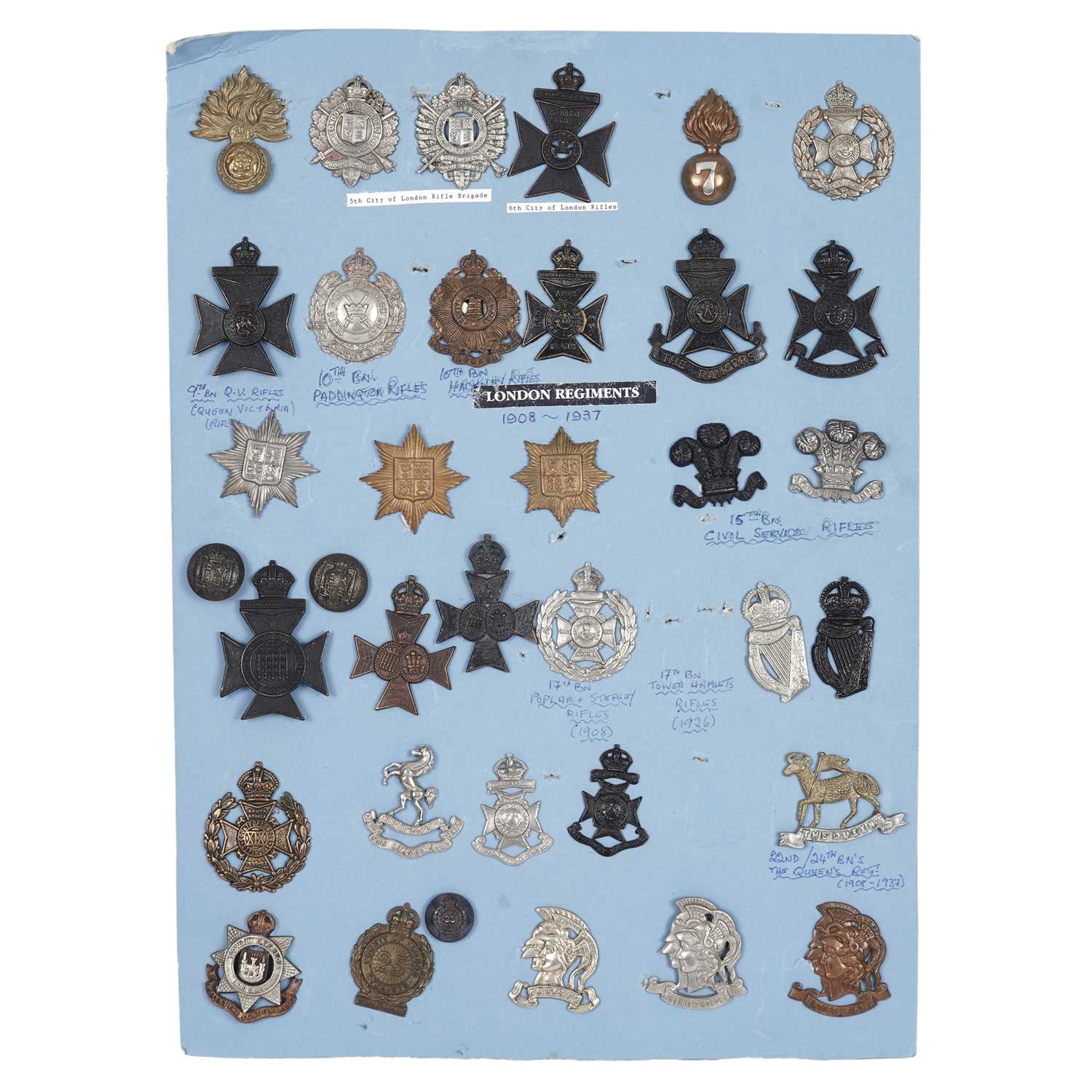 Lot 120 - A display of London regimental cap badges