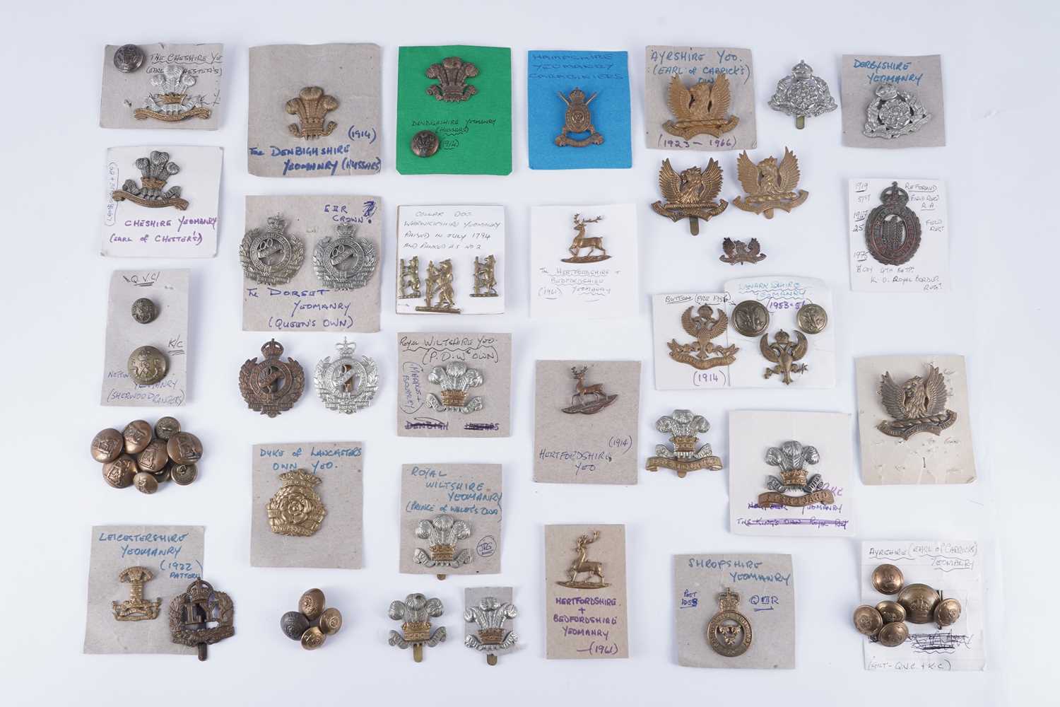 Lot 130 - A selection of British Yeomanry regimental cap badges and other items