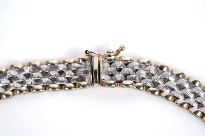Lot 659 - A 9ct white and yellow gold chain necklace; and bracelet set