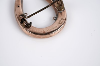 Lot 656 - Two brooches; and a ring