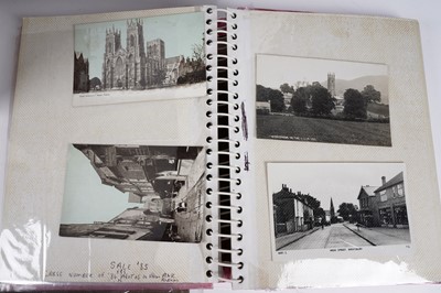 Lot 255 - A selection of holiday-type postcards; and a quantity of British and World stamps