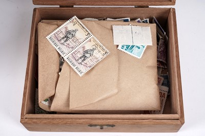 Lot 255 - A selection of holiday-type postcards; and a quantity of British and World stamps