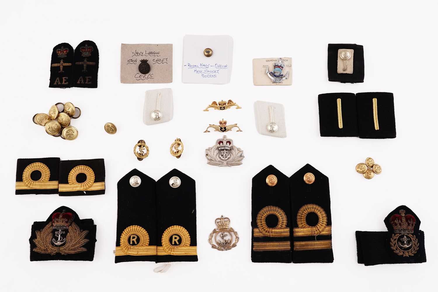 Lot 155 - A selection of Royal Navy badges, epaulettes, buttons and other items