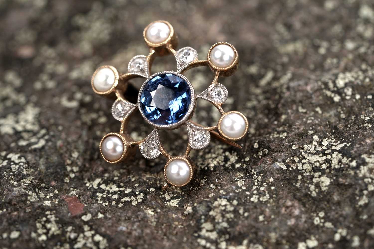Lot 535 - An antique sapphire, pearl, and diamond brooch