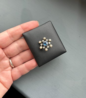 Lot 535 - An antique sapphire, pearl, and diamond brooch