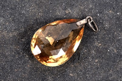 Lot 545 - A citrine rose cut pendant