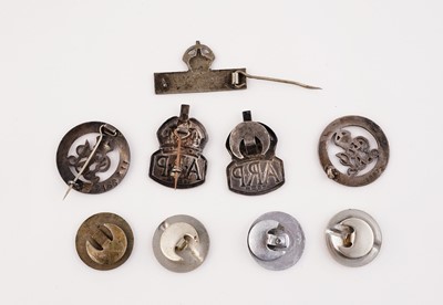 Lot 187 - Two silver Air Raid Patrol lapel badges; and various other badges/buttons