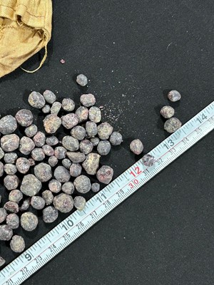 Lot 540 - A collection of rough garnets
