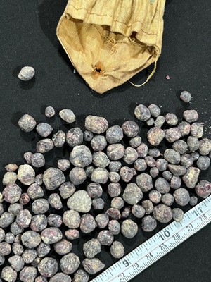Lot 540 - A collection of rough garnets