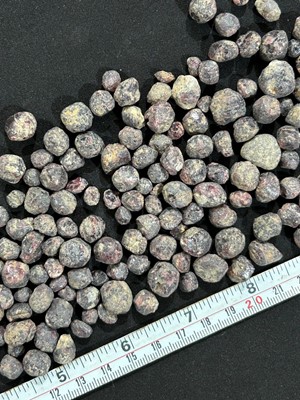 Lot 540 - A collection of rough garnets