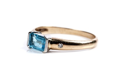 Lot 588 - A modern topaz and diamond ring