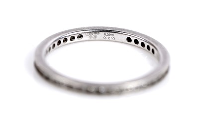 Lot 541 - A contemporary Theo Fennell diamond eternity ring