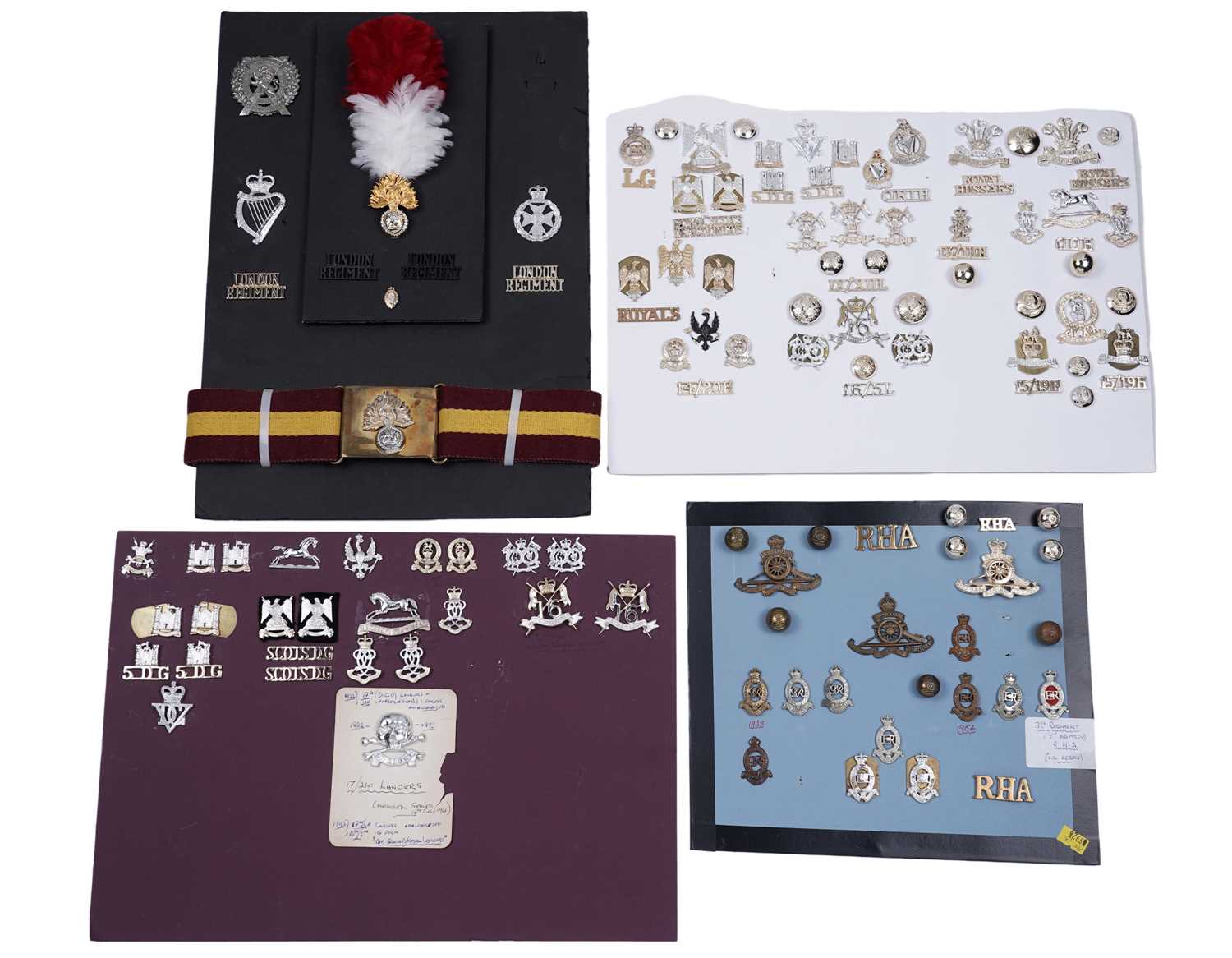 Lot 193 - A selection of displays for British regimental cap badges, buttons and other items