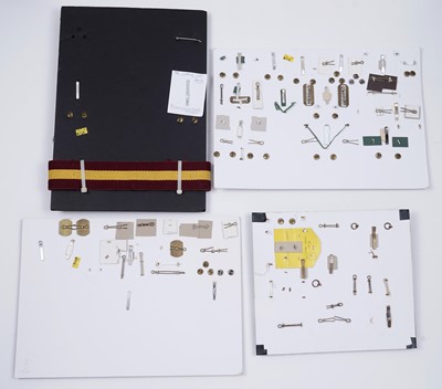 Lot 193 - A selection of displays for British regimental cap badges, buttons and other items