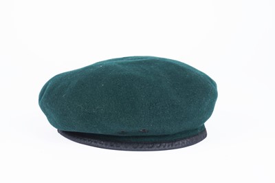 Lot 332 - ﻿﻿A selection of British military berets with badges; and an army officers peaked cap