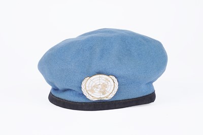 Lot 332 - ﻿﻿A selection of British military berets with badges; and an army officers peaked cap