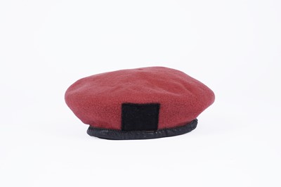 Lot 332 - ﻿﻿A selection of British military berets with badges; and an army officers peaked cap