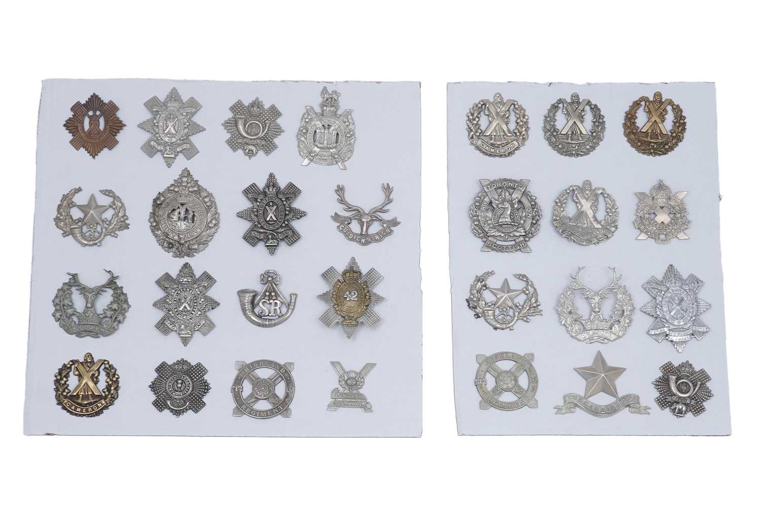Lot 203 - Two displays of Scottish Regimental cap badges