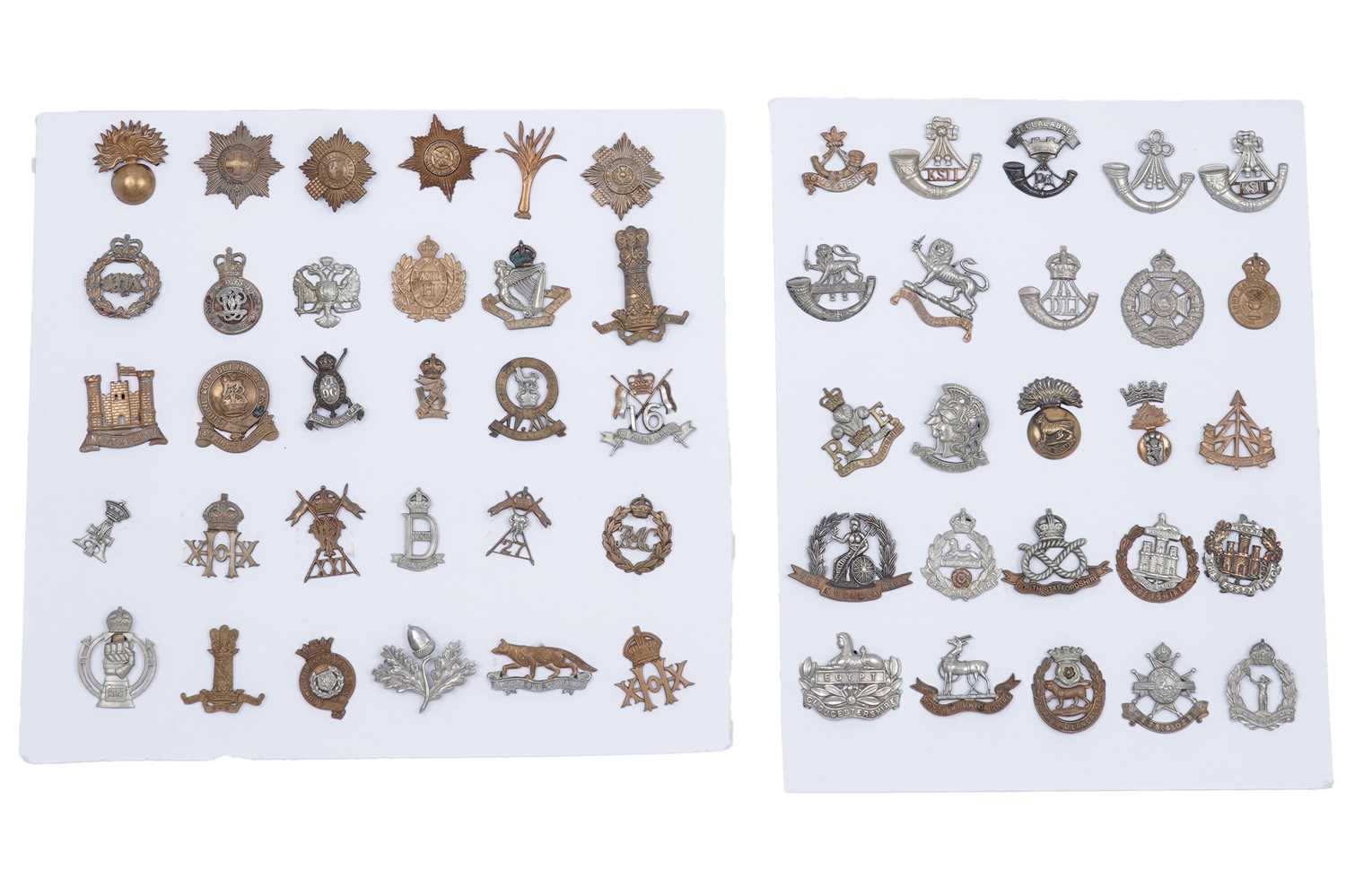 Lot 204 - Two displays of British Regimental cap badges