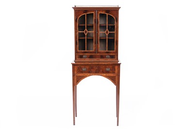 Lot 1052A - An inlaid mahogany satinwood and walnut banded cabinet on stand