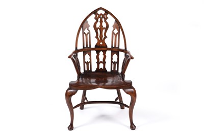 Lot 1068 - A 20th Century Gothic revival Windsor armchair