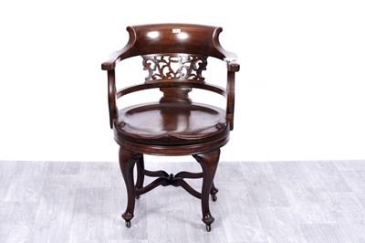 Lot 6 - William Whiteley, London: an early 20th Century mahogany swivel action armchair