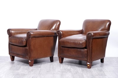 Lot 10 - Laura Ashley: a pair of distressed brown leather armchairs