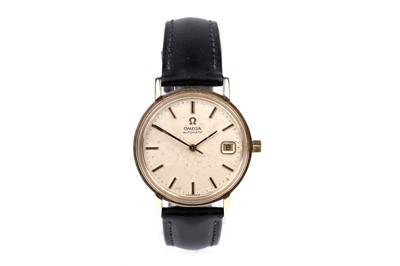 Lot 435 - Omega: a gold cased automatic wristwatch