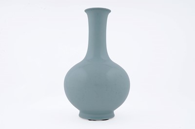 Lot 806 - A pale celadon bottle vase