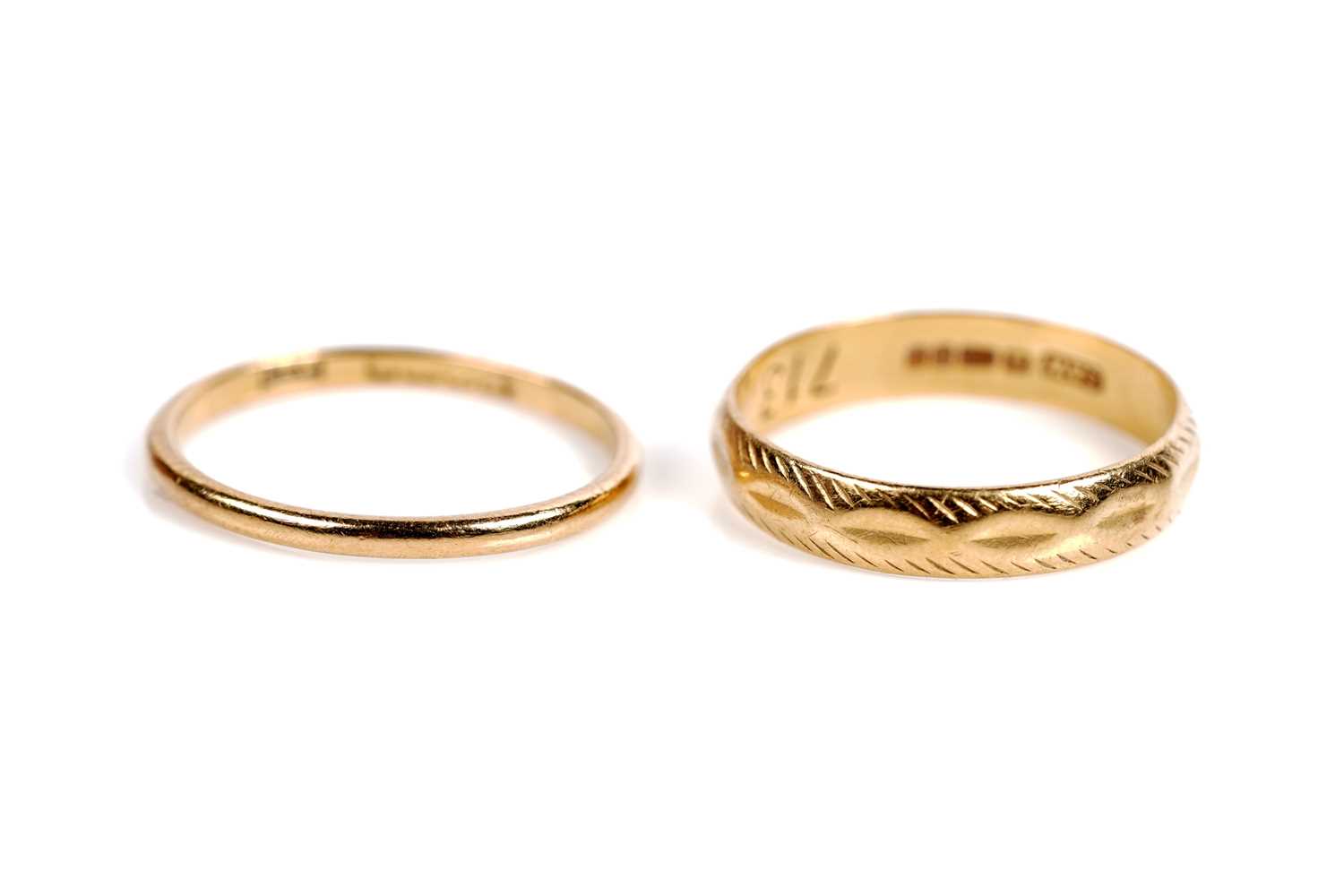 Lot 508 - Two 1930s Art Deco 22ct gold wedding bands