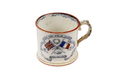 Lot 118 - Three pieces of Staffordshire pottery; and a signed book commemorating the Crimean War